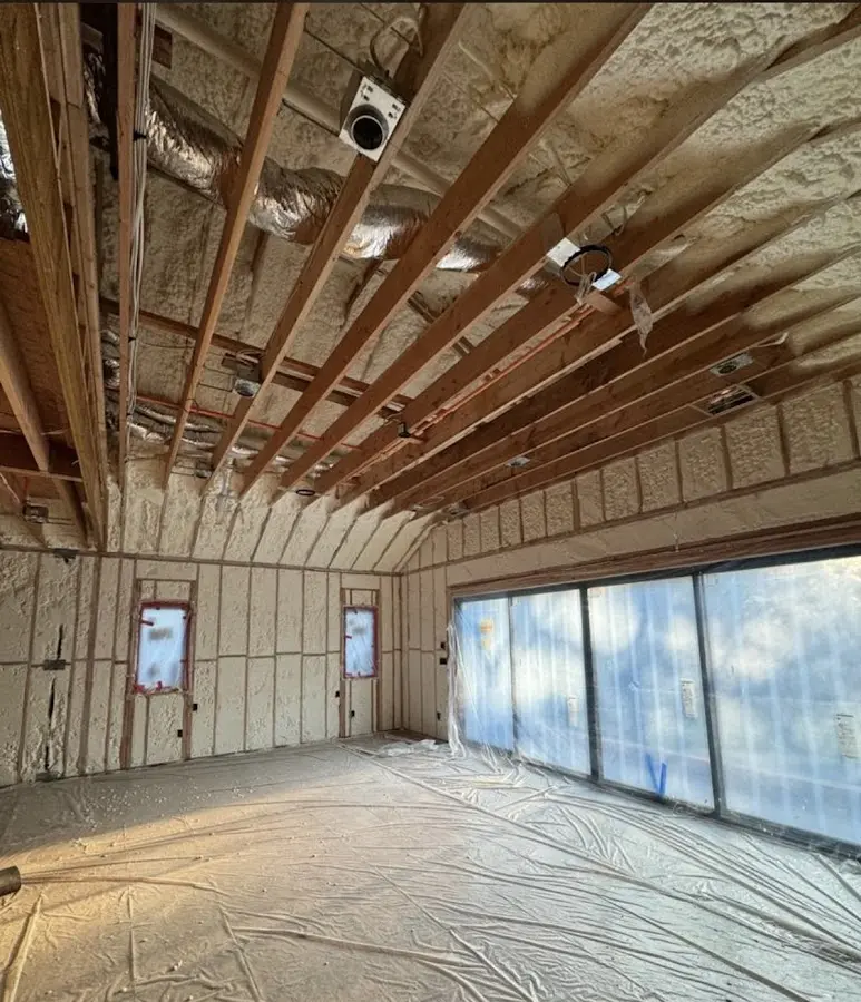 Interior walls and ceiling insulated with spray foam during new construction in White House