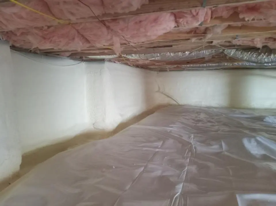 Crawl space encapsulation with closed-cell spray foam for Commercial Roof Restoration in White House